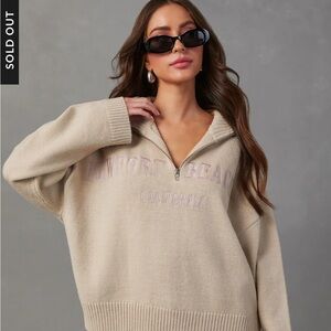 Le Lis Cream Sweater with Purple Text